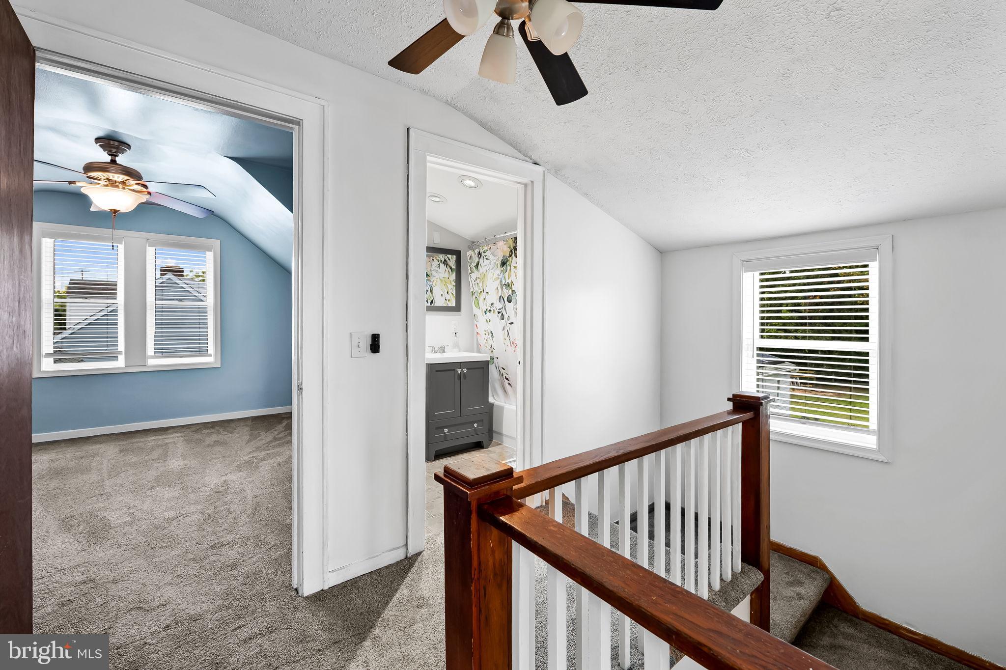 3332 Dublin Road Darlington, MD 21034 - Photo 21 of 39 a view of a hallway with windows and stairs