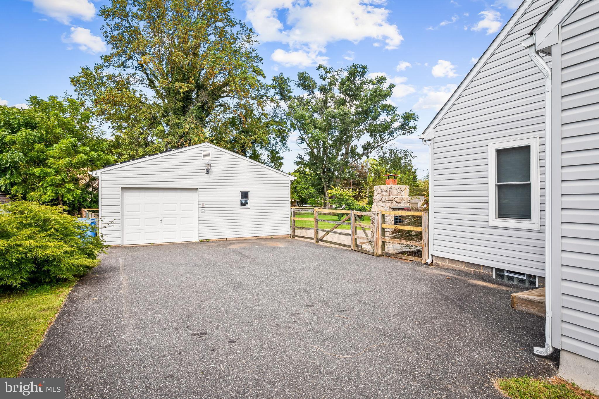 3332 Dublin Road Darlington, MD 21034 - Photo 29 of 39 a backyard of a house with plants and trees