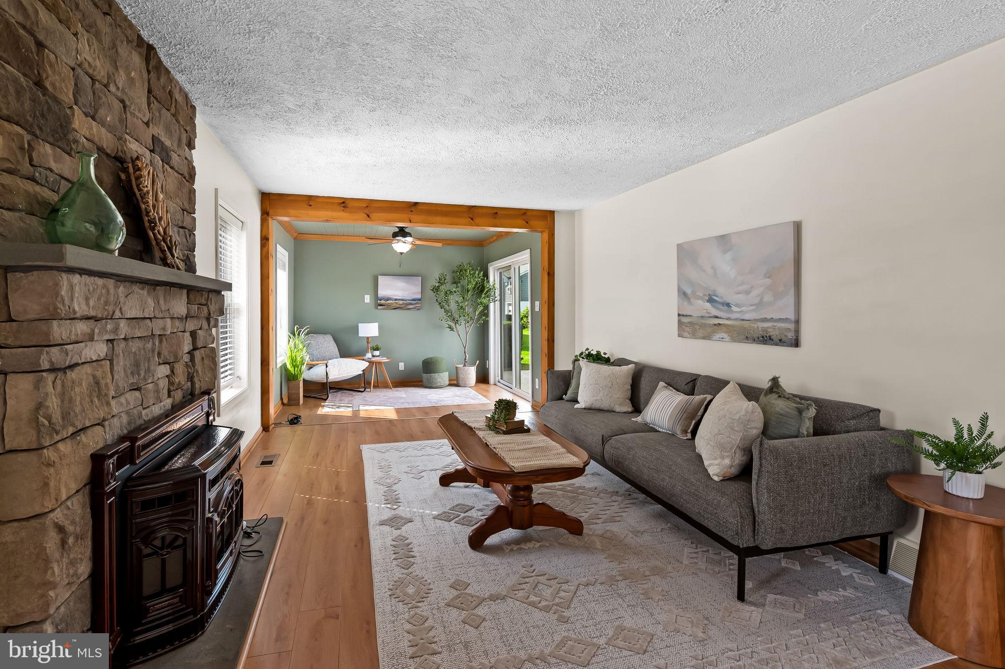 3332 Dublin Road Darlington, MD 21034 - Photo 4 of 39 a living room with furniture and a fireplace