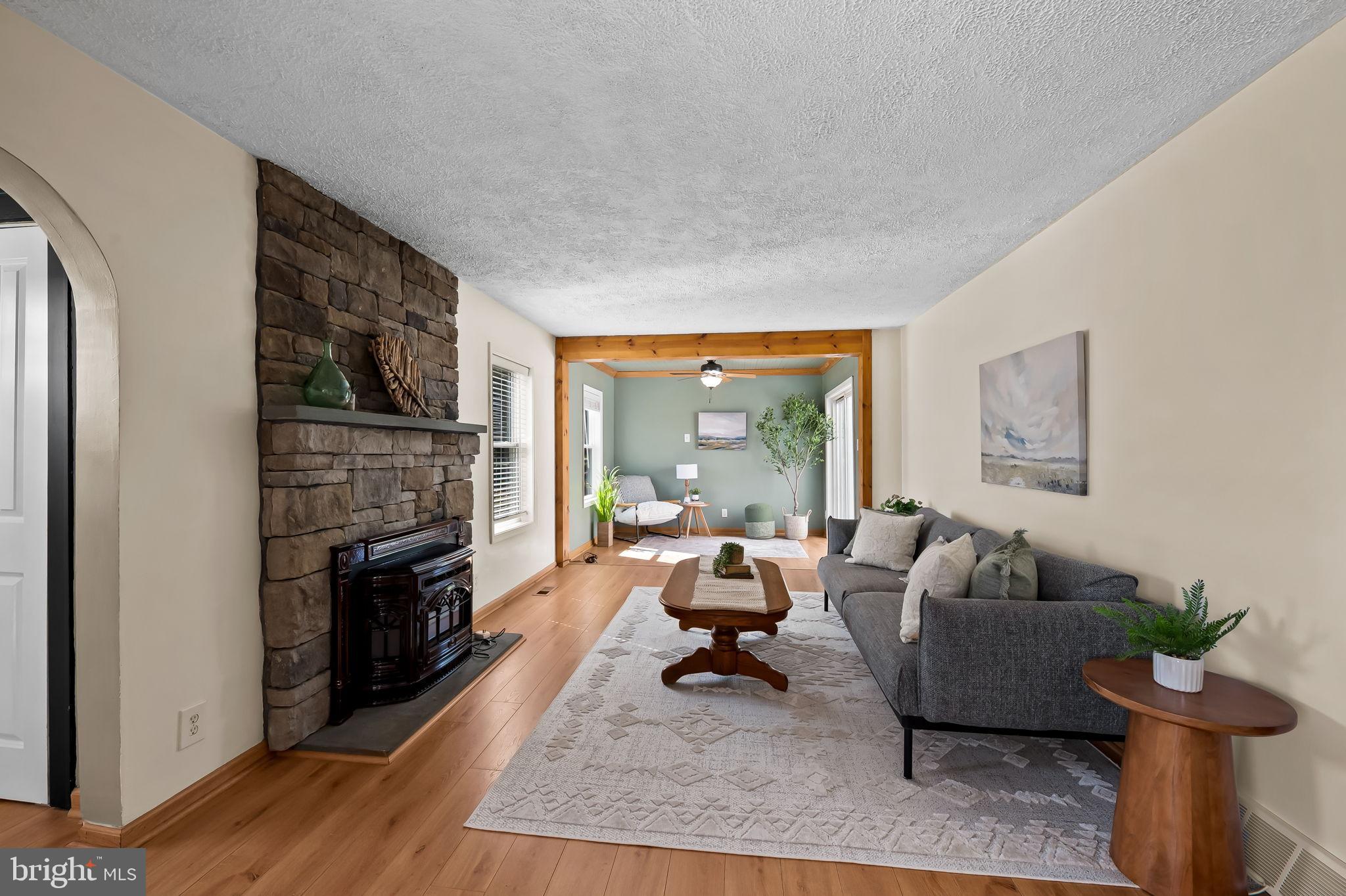 3332 Dublin Road Darlington, MD 21034 - Photo 5 of 39 a living room with furniture and a fireplace