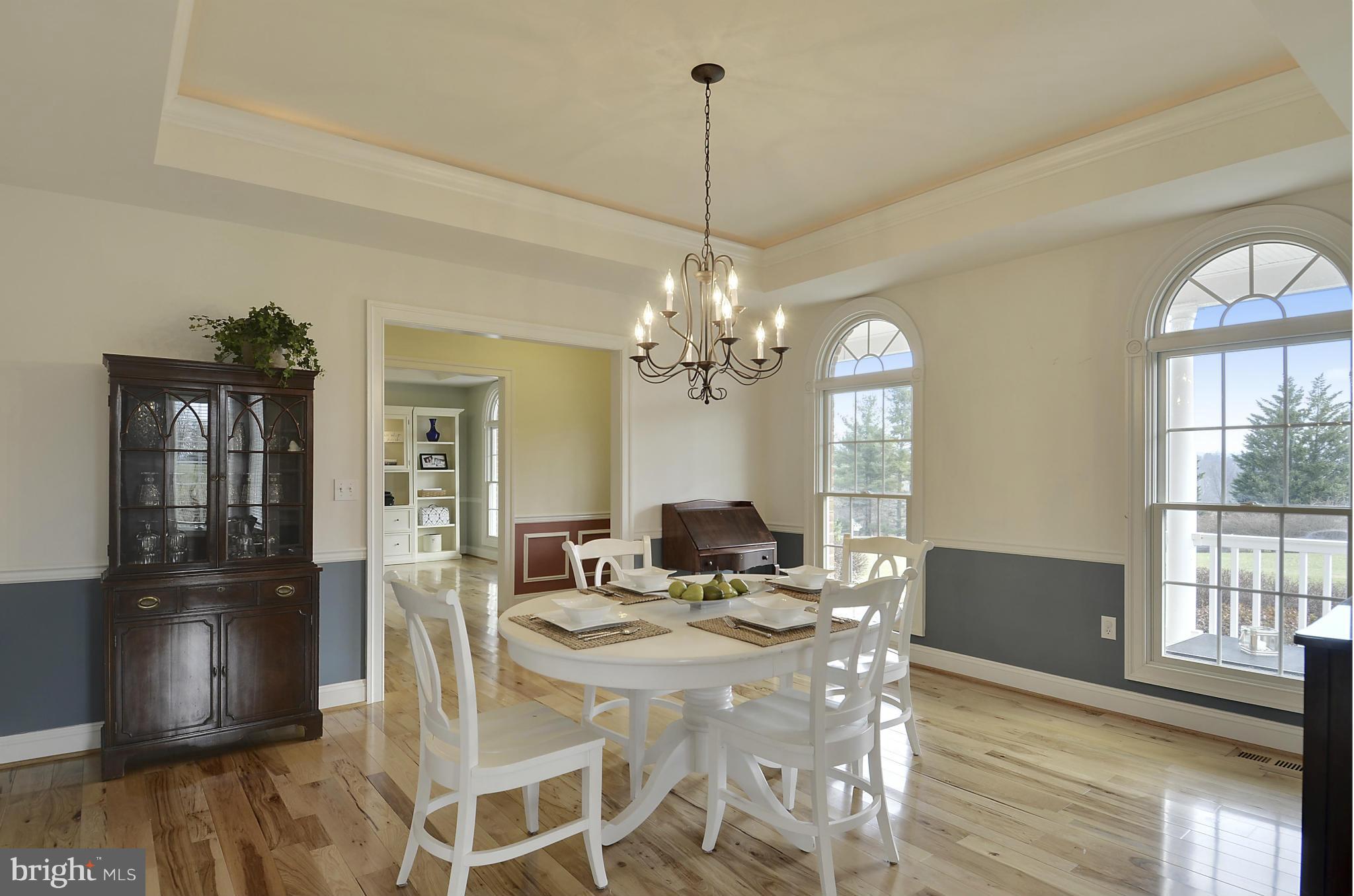 8727 Pete Wiles Road Middletown, MD 21769 - Photo 6 of 30 COVE MOULDING WITH UPLIGHTING IN THE DINING ROOM