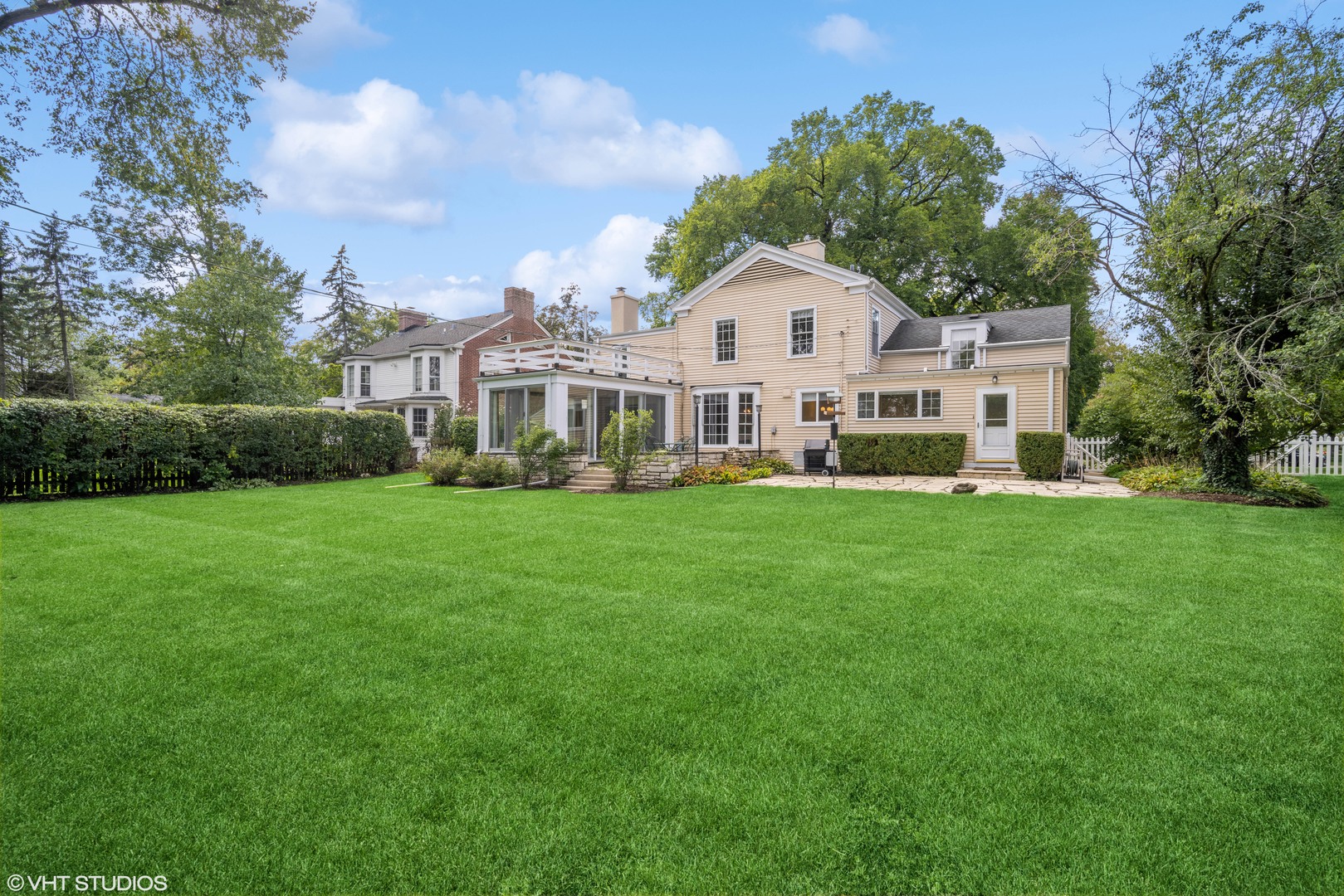 715 Wagner Road Glenview, IL 60025 - Photo 16 of 21 a view of a house with a yard