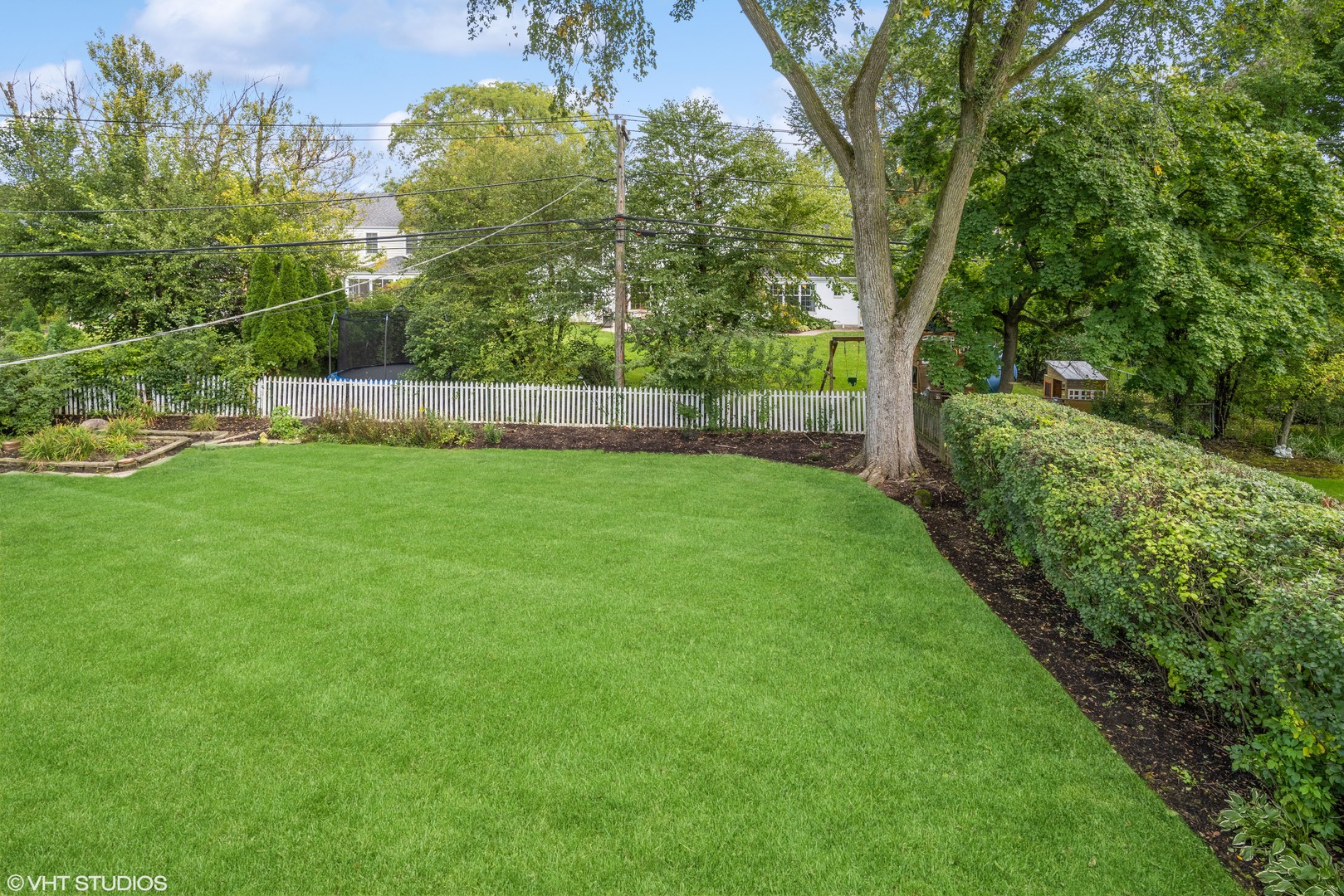 715 Wagner Road Glenview, IL 60025 - Photo 17 of 21 a view of a yard with a large trees