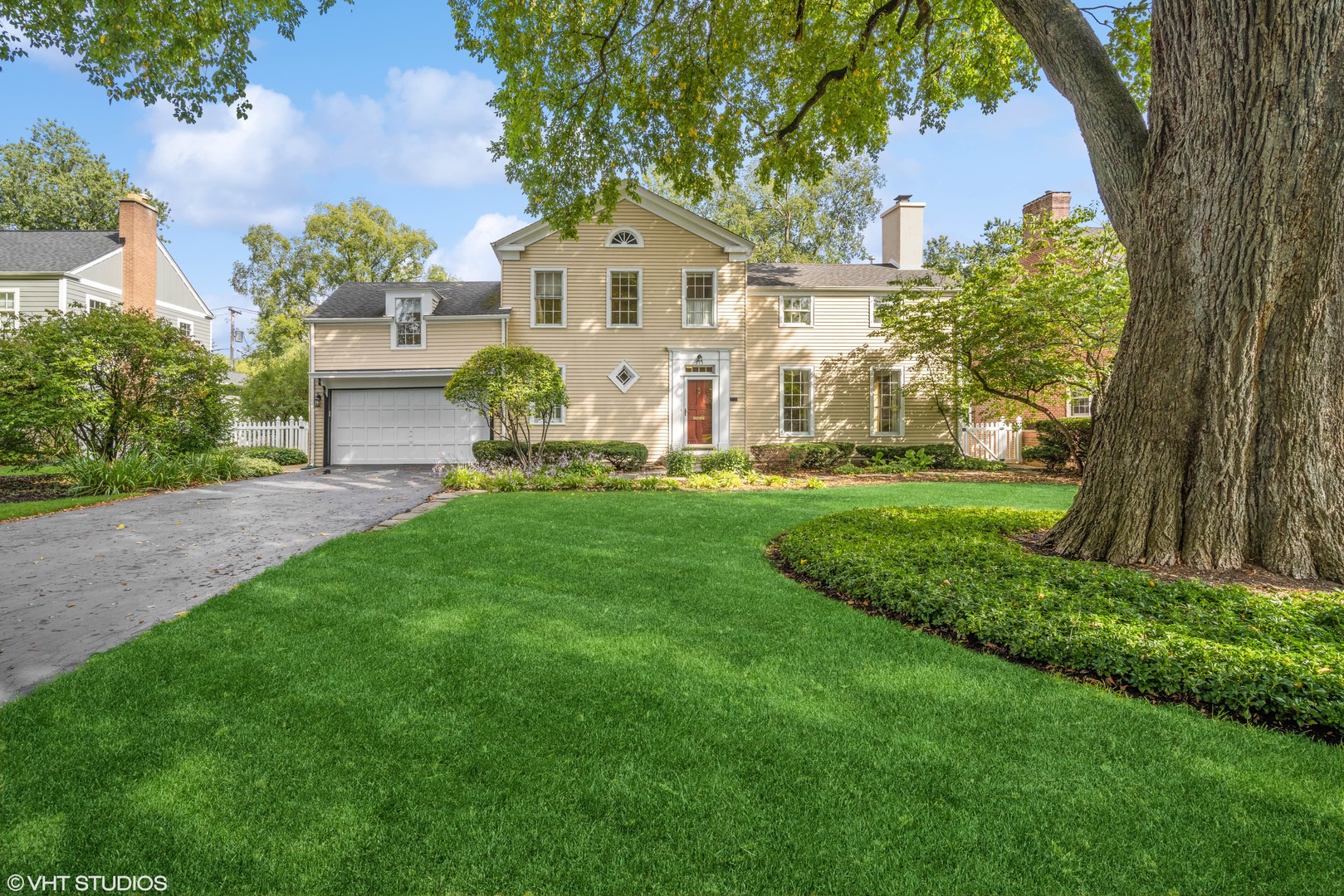 715 Wagner Road Glenview, IL 60025 - Photo 2 of 21 a front view of a house with a yard