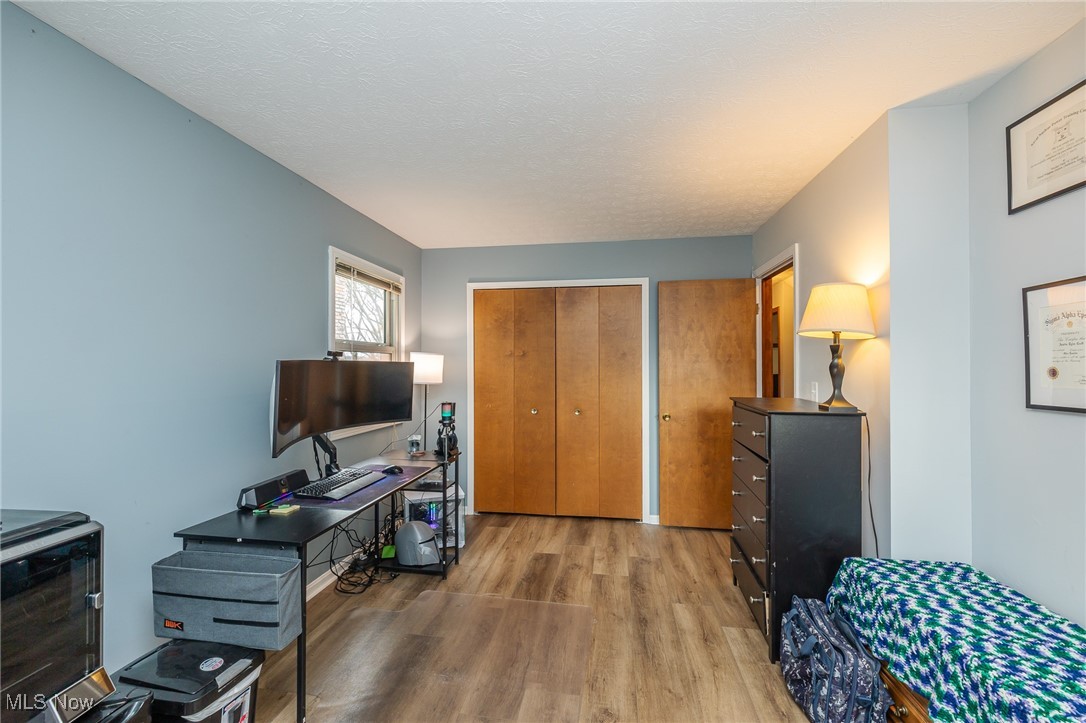7711 Diagonal Road Kent, OH 44240 - Photo 29 of 45 Office featuring light wood-style flooring and a textured ceiling