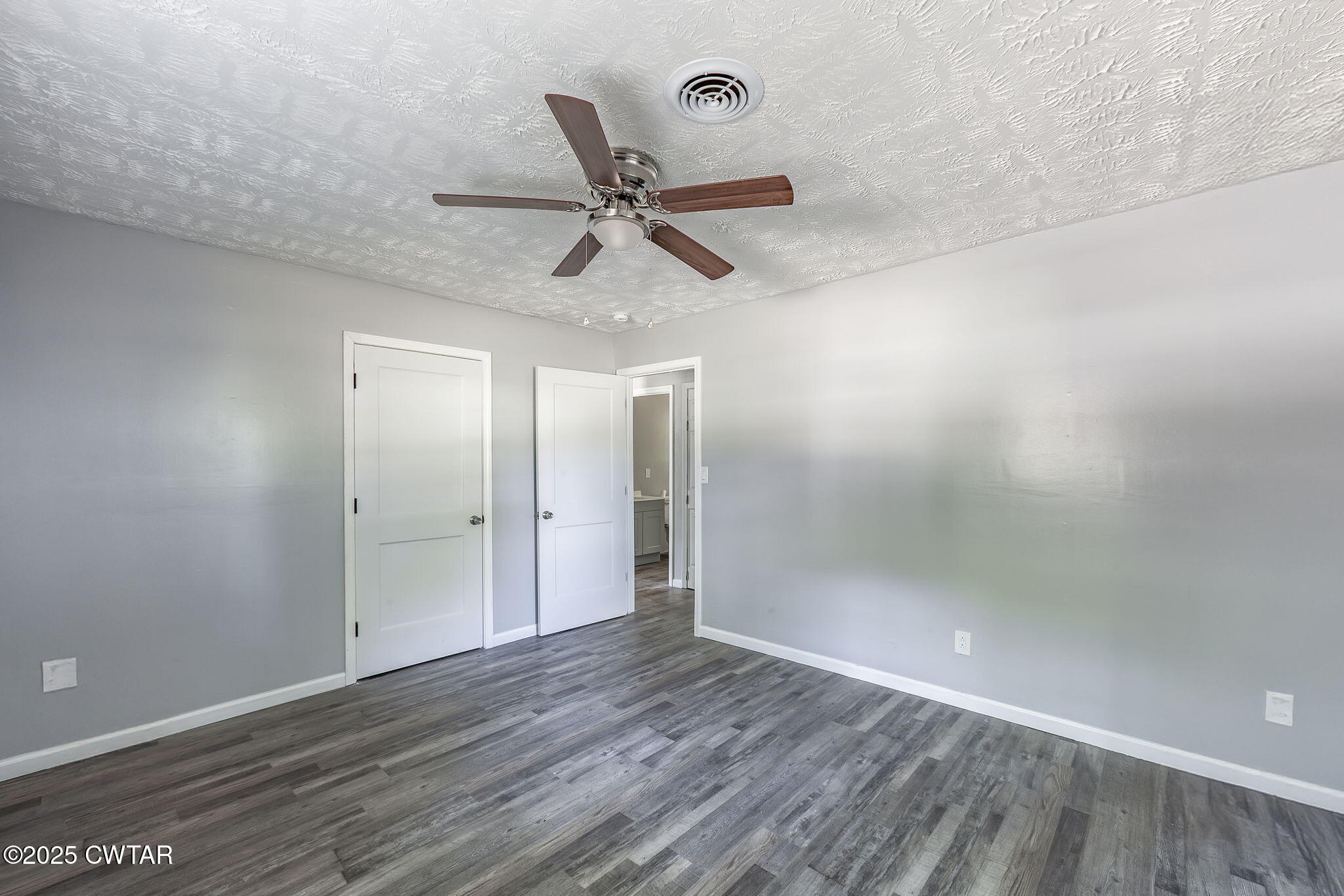 115 Neff Street Jackson, TN 38301 - Photo 16 of 23 wooden floor in an empty room