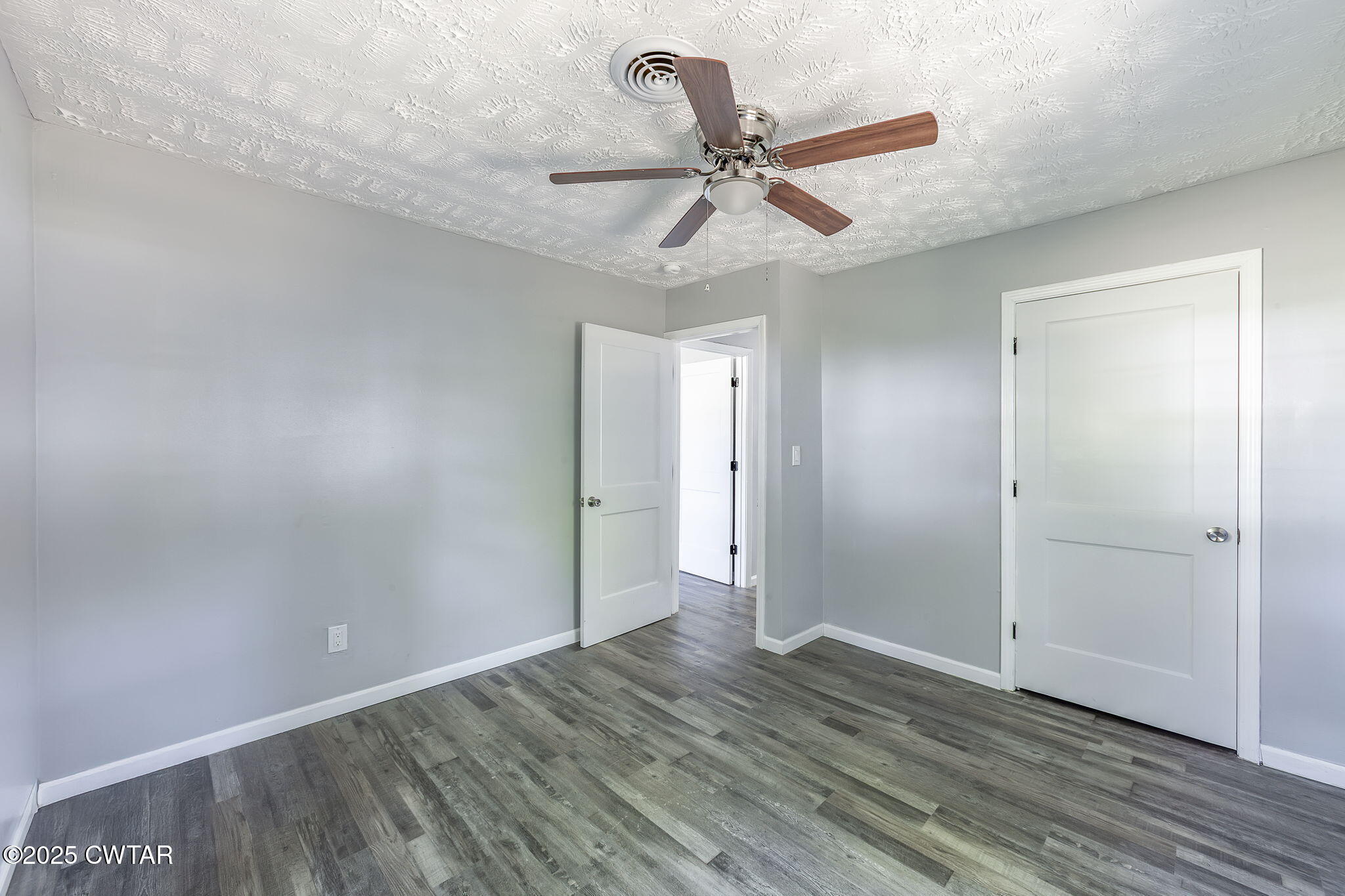 115 Neff Street Jackson, TN 38301 - Photo 20 of 23 a view of an empty room and wooden floor