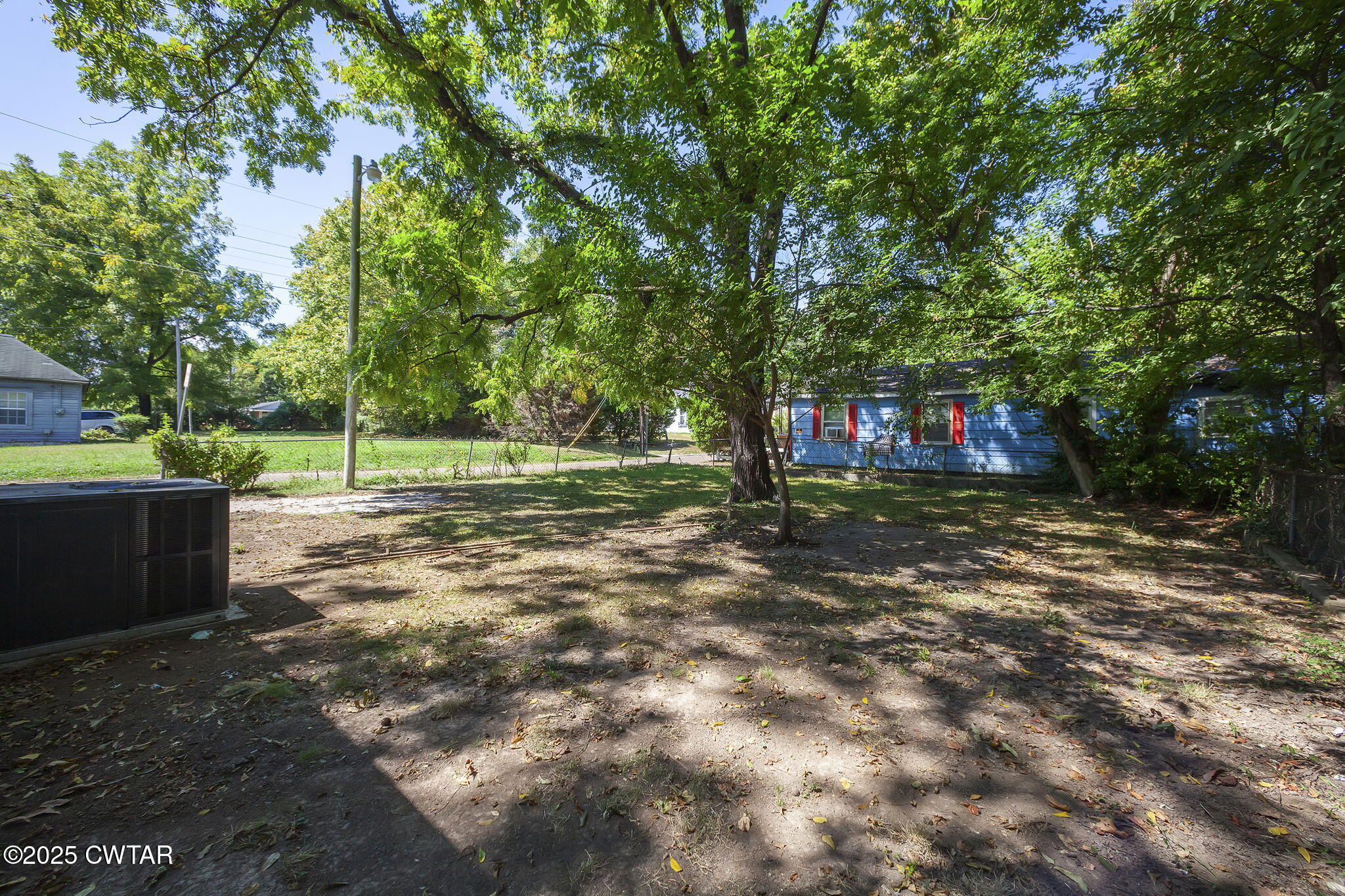 115 Neff Street Jackson, TN 38301 - Photo 22 of 23 a view of a house with a yard