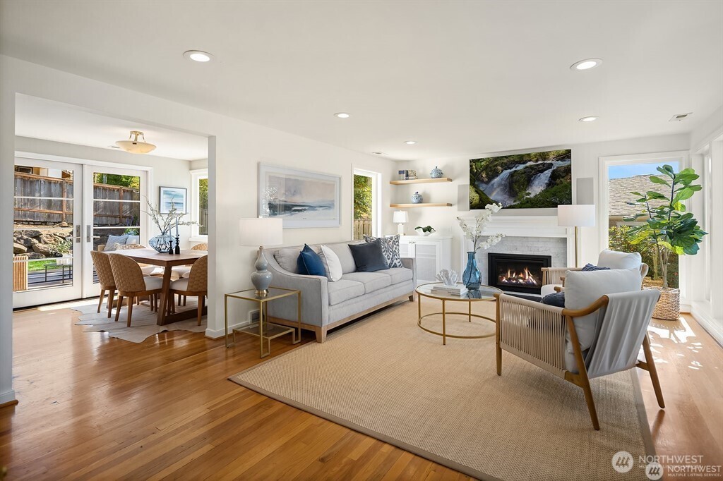 5606 59th Avenue Northeast Seattle, WA 98105 - Photo 4 of 5 a living room with furniture and a fireplace