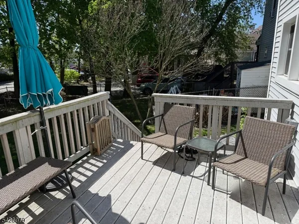 a view of outdoor space with deck and green space