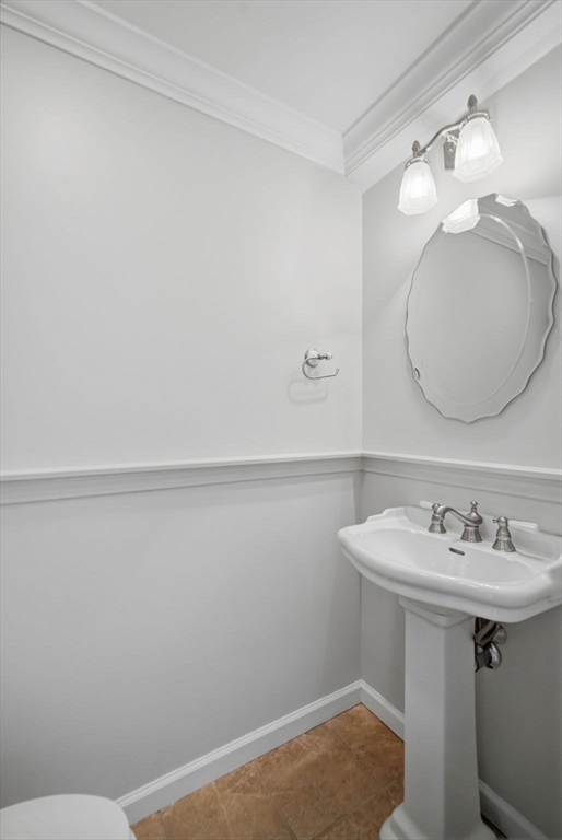 1155 Dickinson Street, Unit 1155 Springfield, MA 01108 - Photo 13 of 29 a bathroom with a sink and mirror