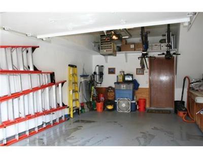 460 Moonridge Drive, Unit E2 Edwards, CO 81632 - Photo 11 of 12 a garage room with furniture and a wooden floor