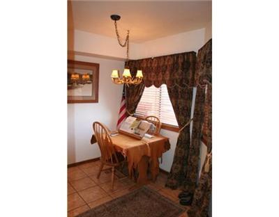 460 Moonridge Drive, Unit E2 Edwards, CO 81632 - Photo 6 of 12 a view of a dining room with a table and chairs