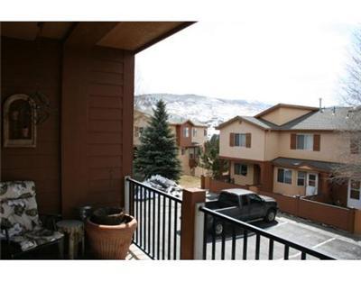 460 Moonridge Drive, Unit E2 Edwards, CO 81632 - Photo 7 of 12 a view of a house with backyard and deck