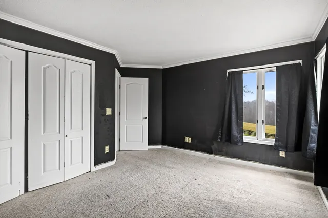 an empty room with windows