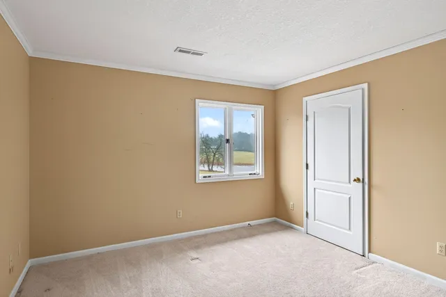 a spacious bathroom with a double vanity sink and mirror