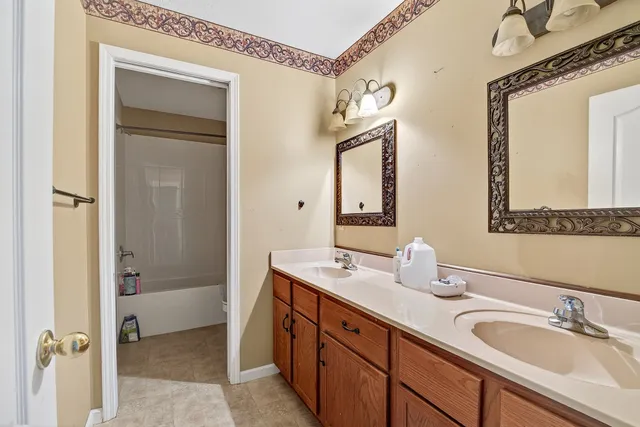 a view of a livingroom with a staircase