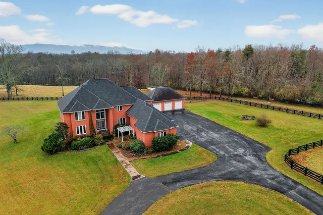 a view of a swimming pool and mountains