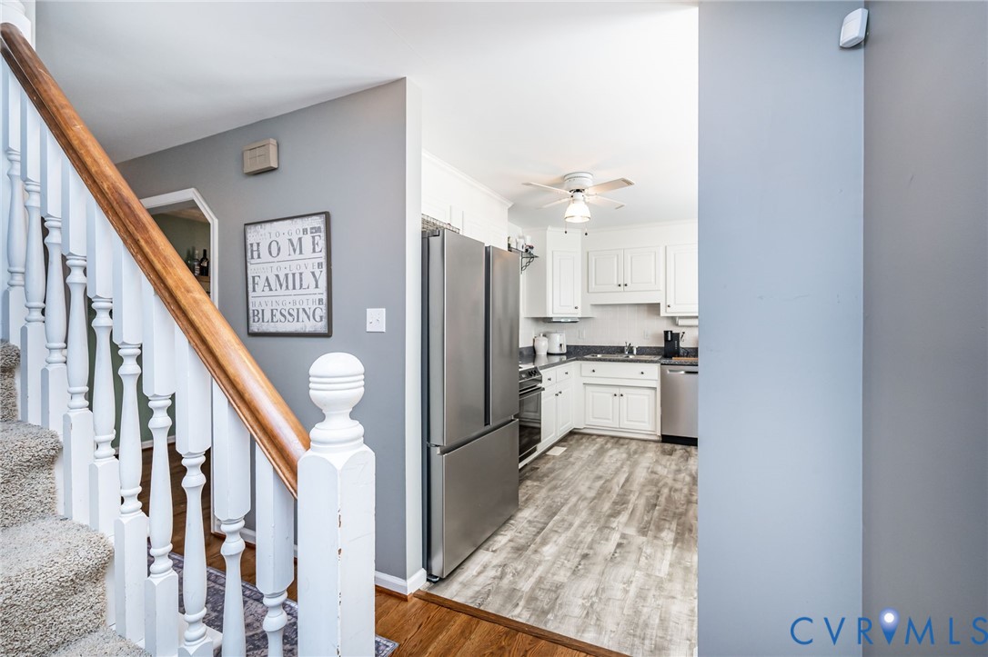 2423 Brookforest Road Midlothian, VA 23112 - Photo 13 of 40 a kitchen with cabinets and stainless steel appliances