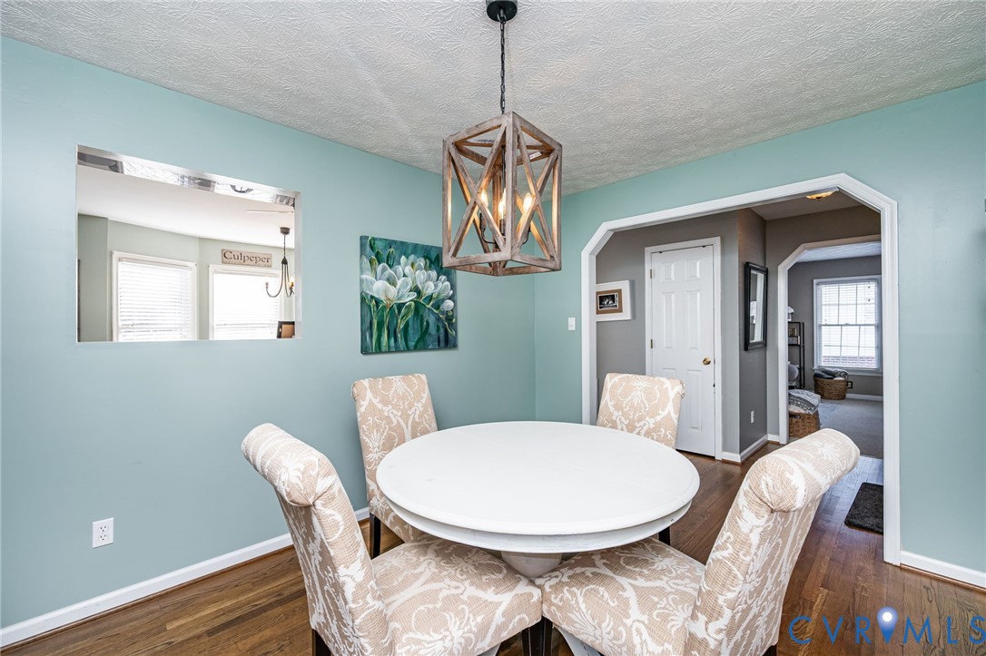 2423 Brookforest Road Midlothian, VA 23112 - Photo 15 of 40 a view of a dining room with furniture