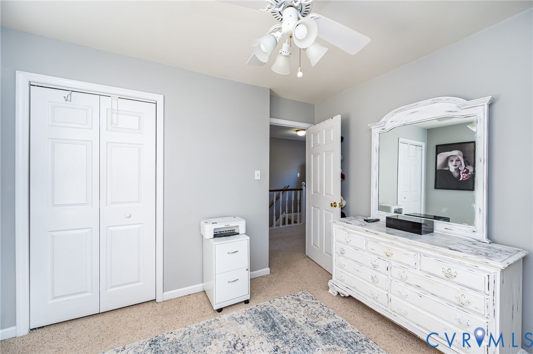 2423 Brookforest Road Midlothian, VA 23112 - Photo 31 of 40 a spacious bathroom with a granite countertop sink and a mirror