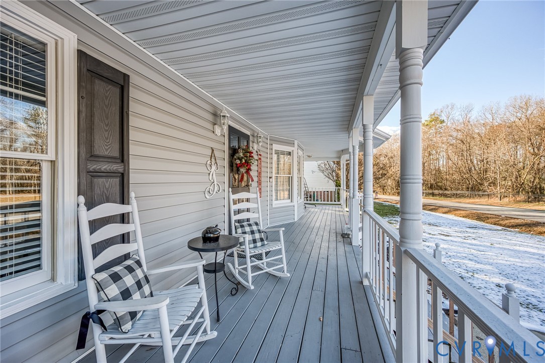 2423 Brookforest Road Midlothian, VA 23112 - Photo 7 of 40 a view of balcony with wooden floor and outdoor seating