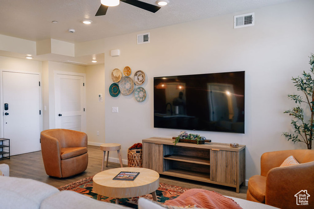 961 West Akoya Pearl Road, Unit 201 St. George, UT 84790 - Photo 13 of 67 Living room featuring wood finished floors, recessed lighting, a textured ceiling, and ceiling fan