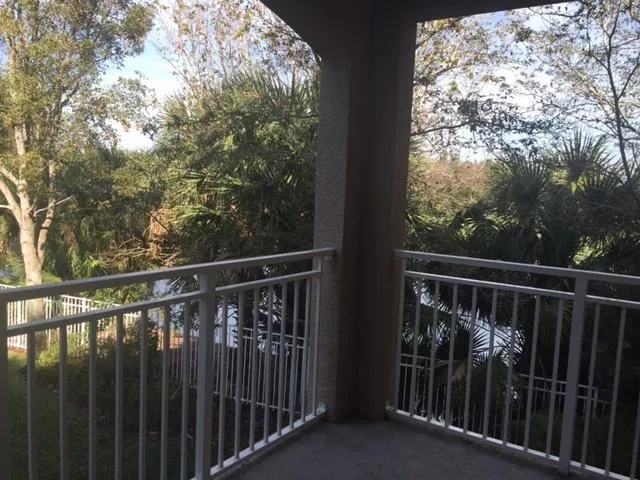 a view of balcony with deck