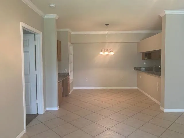 a view of a kitchen with a sink and dishwasher in a kitchen