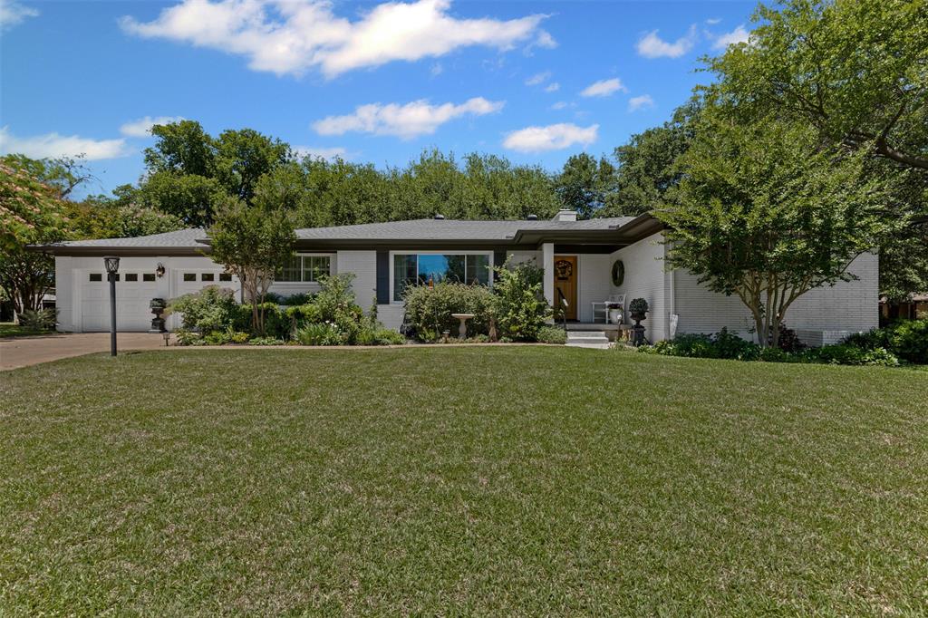4304 Warnock Court Fort Worth, TX 76109 - Photo 1 of 36 a front view of house with yard and green space