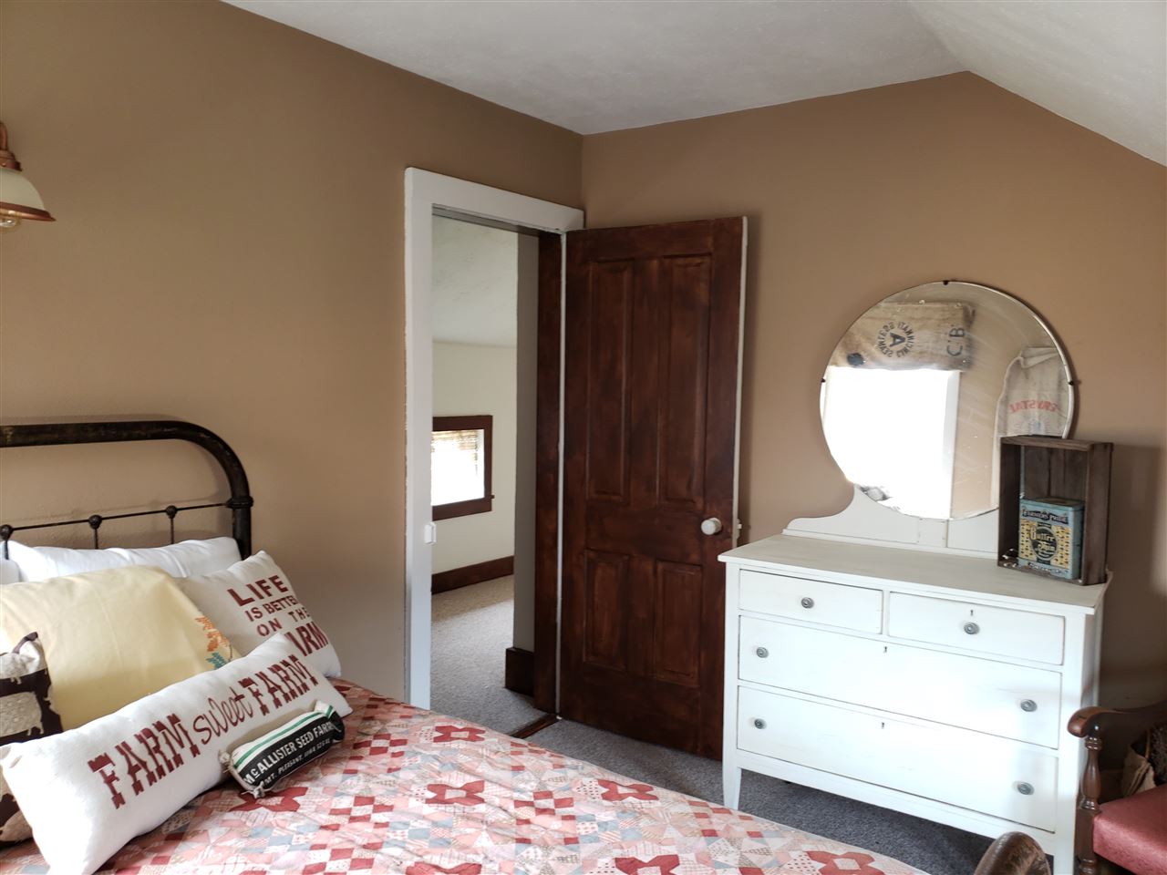 10410 North Church Road Davis, IL 61019 - Photo 16 of 25 a bedroom with a bed and a dresser