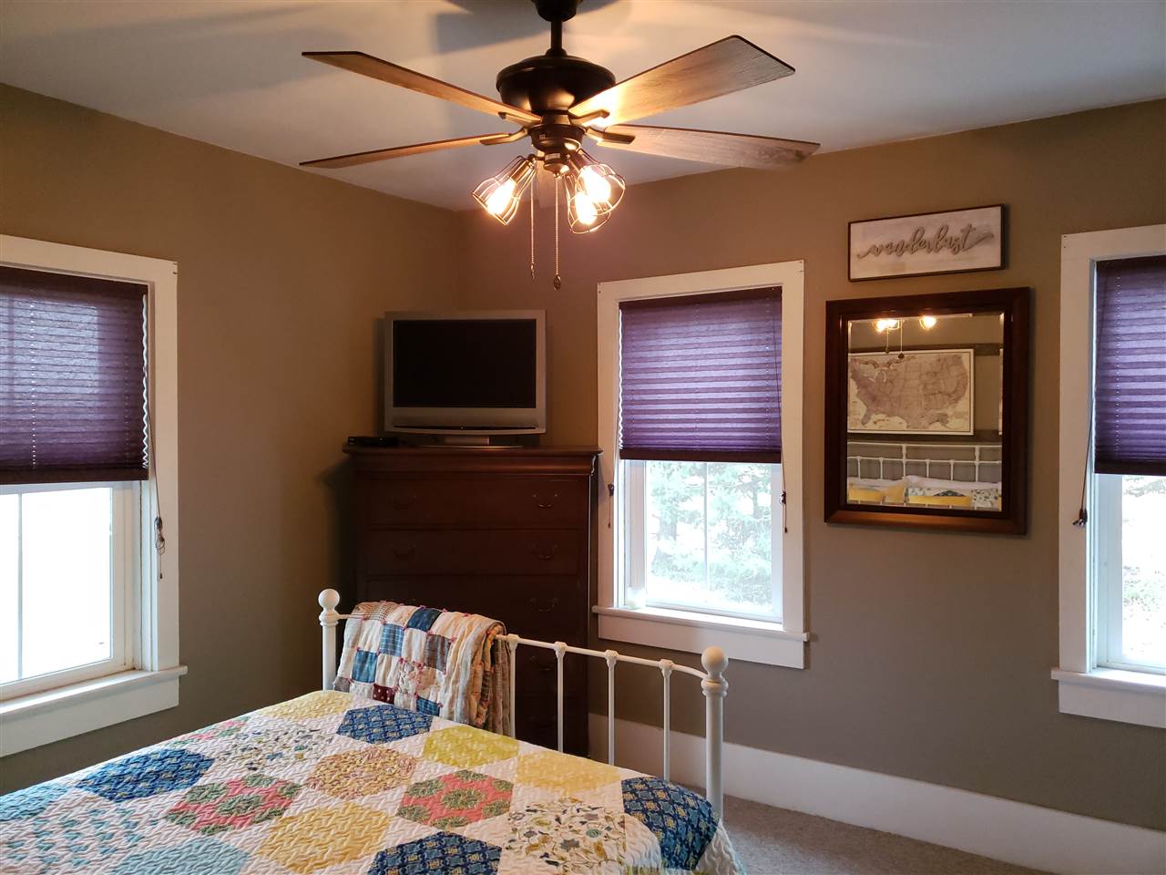 10410 North Church Road Davis, IL 61019 - Photo 2 of 25 a bedroom with a bed and a window