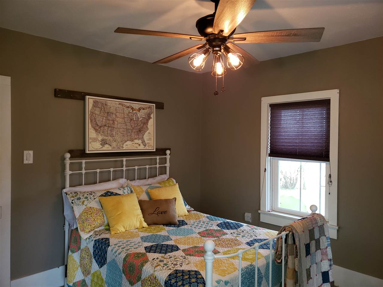 10410 North Church Road Davis, IL 61019 - Photo 3 of 25 a bedroom with a bed and window