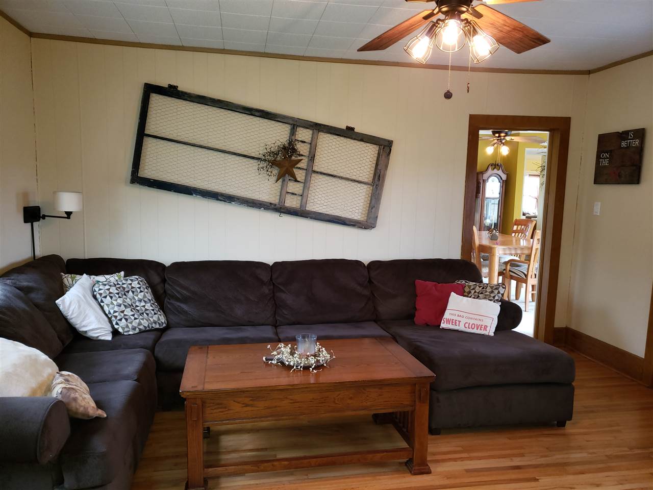 10410 North Church Road Davis, IL 61019 - Photo 7 of 25 a living room with furniture and a wooden floor