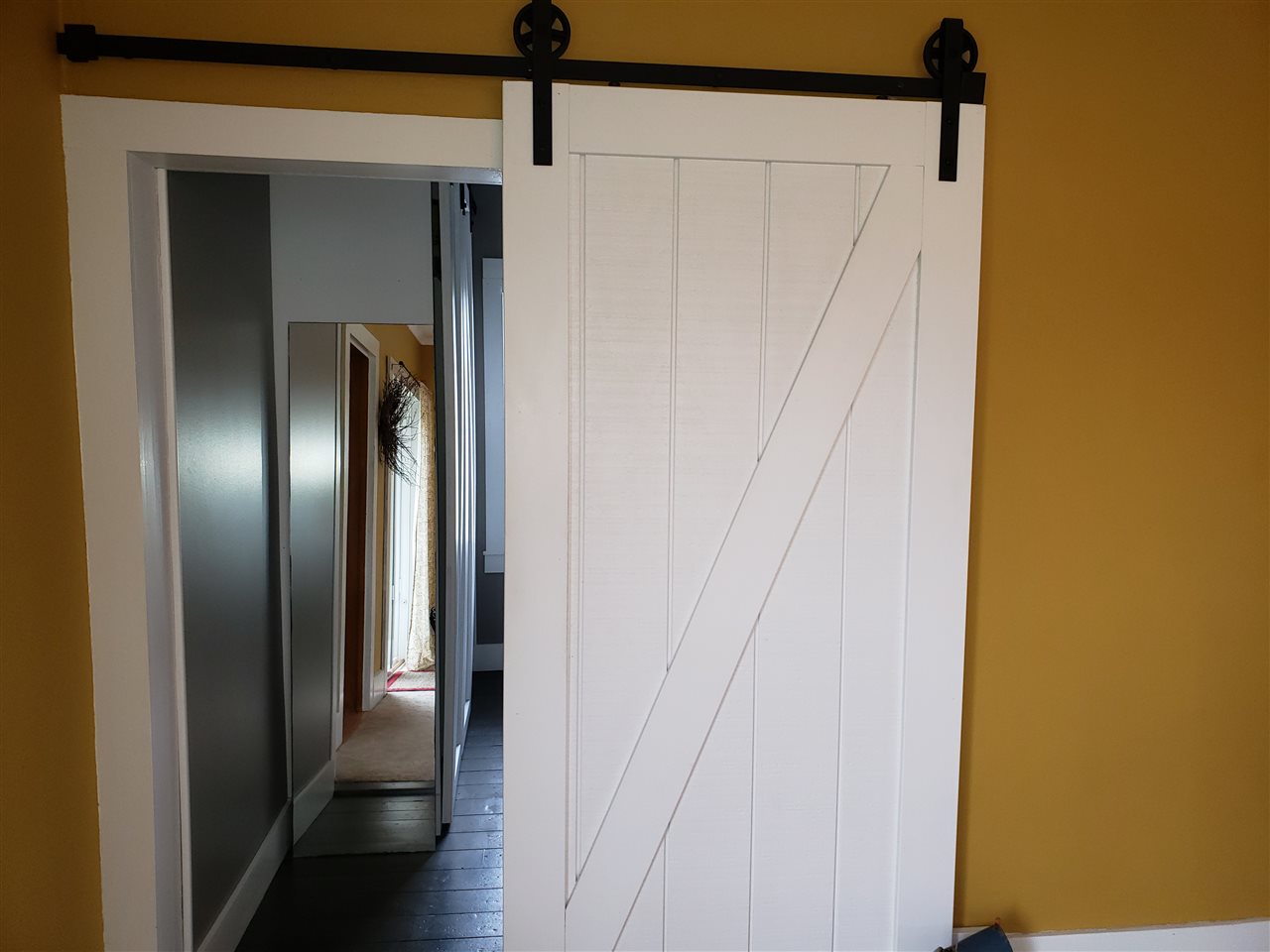 10410 North Church Road Davis, IL 61019 - Photo 10 of 25 a view of a hallway with wooden floor