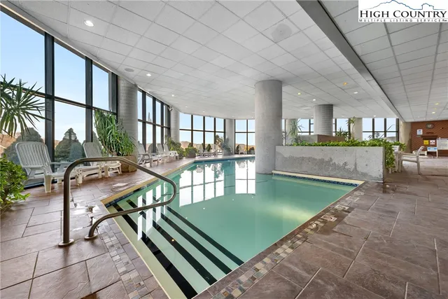 a view of a chairs and table in a patio