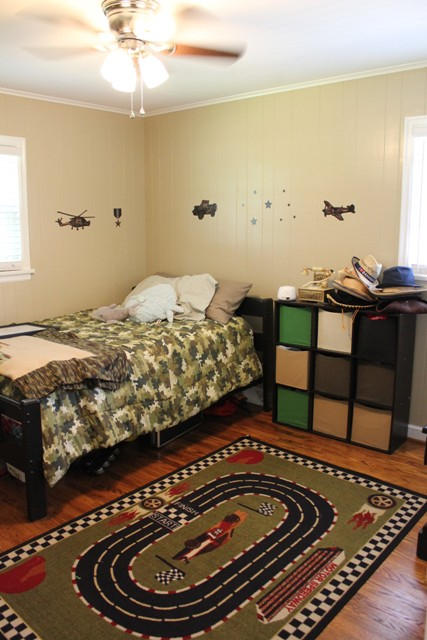 401 Monty Road Boones Mill, VA 24065 - Photo 15 of 30 a bedroom with a bed and wooden floor