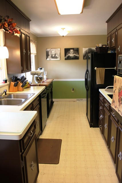 401 Monty Road Boones Mill, VA 24065 - Photo 5 of 30 a kitchen that has a sink and a stove