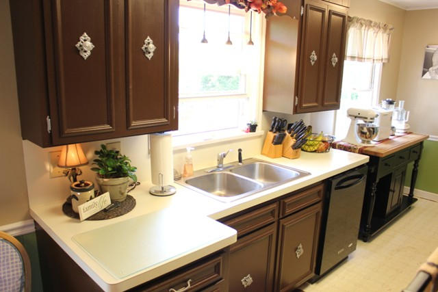 401 Monty Road Boones Mill, VA 24065 - Photo 7 of 30 a kitchen with a sink and cabinets