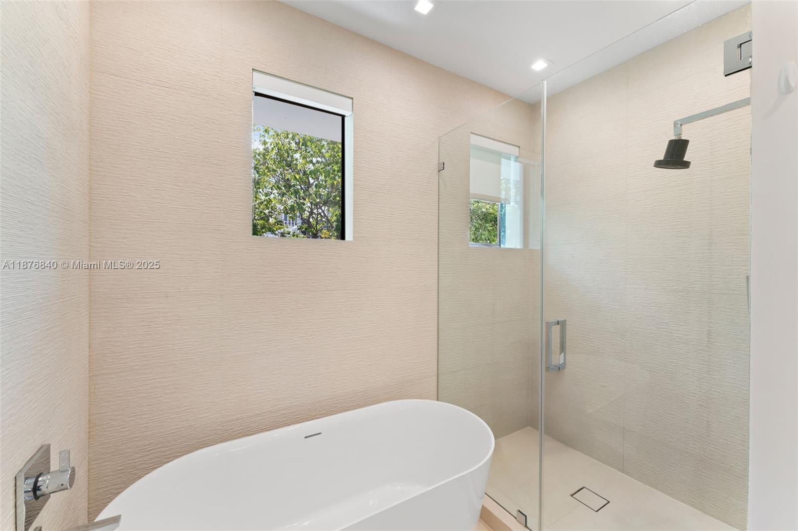 3132 Plaza Street Miami, FL 33133 - Photo 18 of 36 a bathroom with a toilet and shower