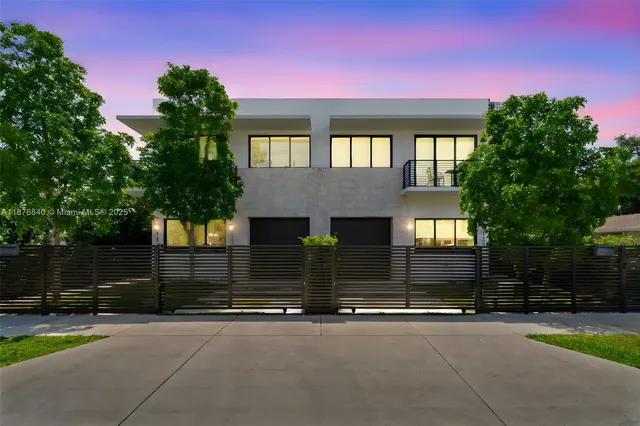 front view of a house with a street