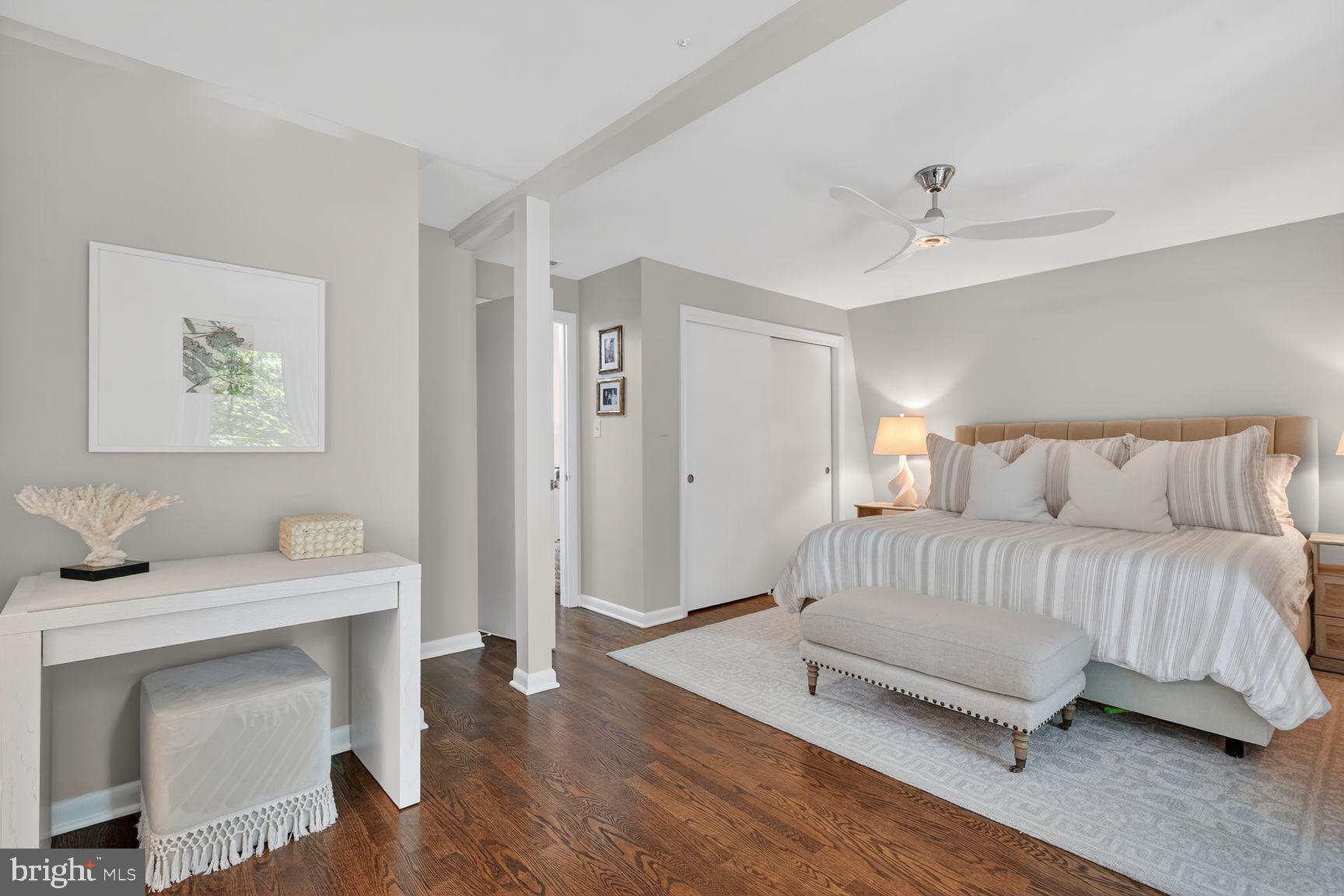 11201 Wedge Drive Reston, VA 20190 - Photo 17 of 31 a bedroom with a bed and a table