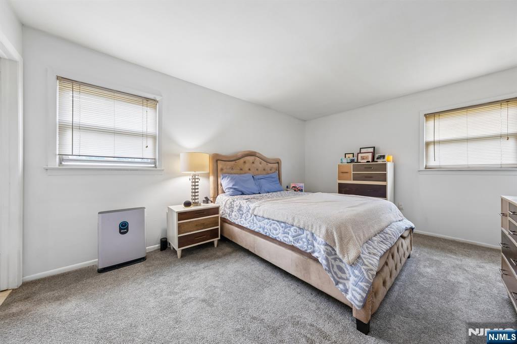 2 Caryn Place Fairfield, NJ 07004 - Photo 11 of 35 a bedroom with a bed and a window