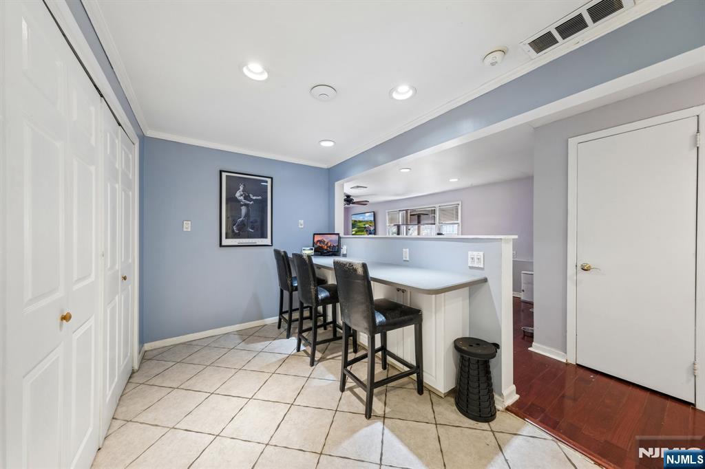 2 Caryn Place Fairfield, NJ 07004 - Photo 23 of 35 a kitchen with a table and chairs