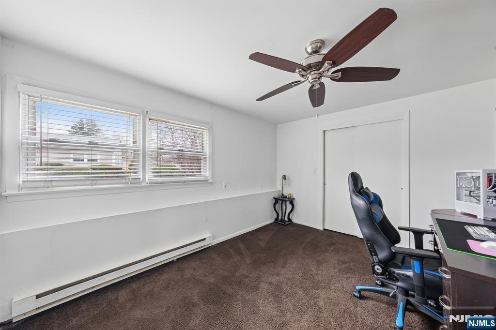 2 Caryn Place Fairfield, NJ 07004 - Photo 29 of 35 a view of a workspace with furniture and a window