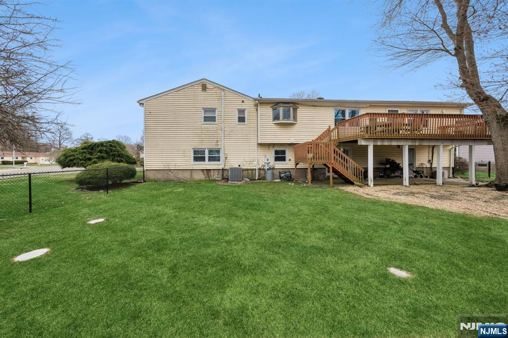 2 Caryn Place Fairfield, NJ 07004 - Photo 31 of 35 a view of a house with backyard and porch