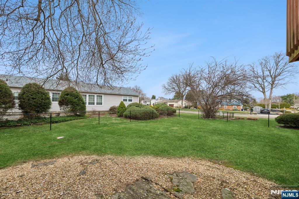 2 Caryn Place Fairfield, NJ 07004 - Photo 34 of 35 a view of a park with large trees