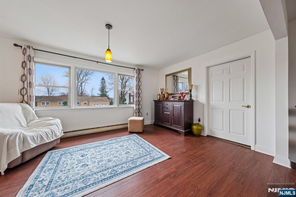 2 Caryn Place Fairfield, NJ 07004 - Photo 8 of 35 a living room with furniture and a window