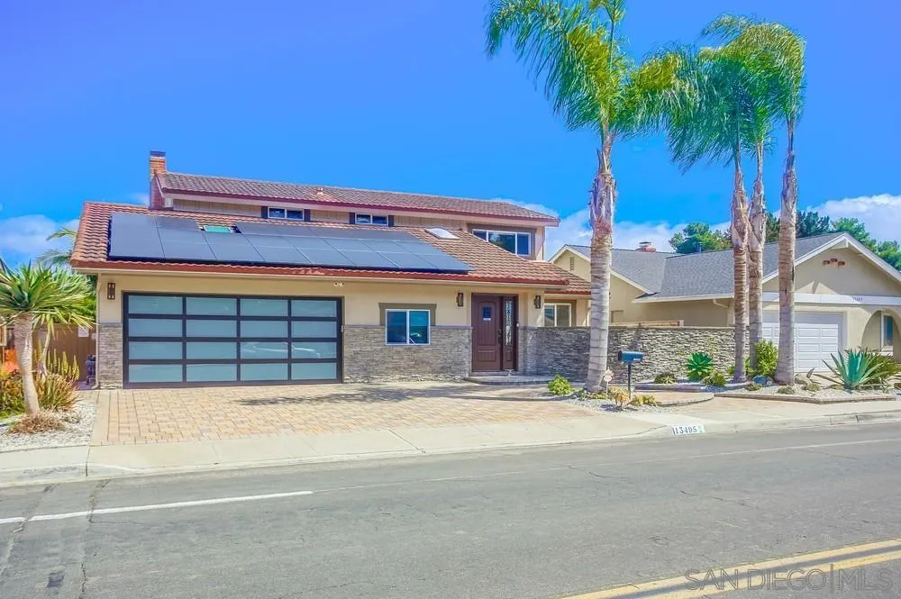 a view of a building with a yard