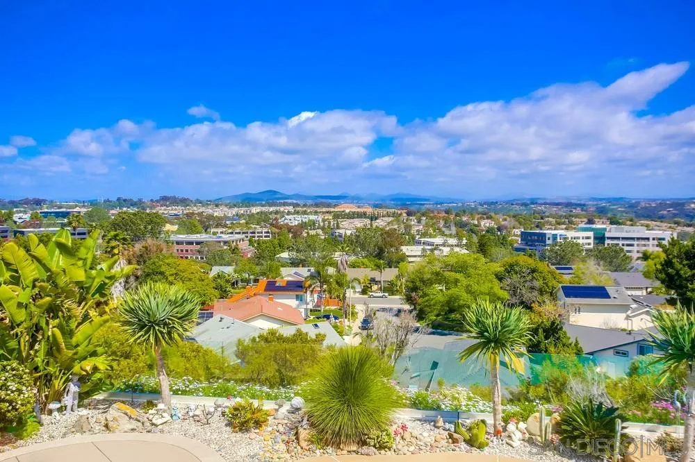 13495 Mango Drive Del Mar, CA 92014 - Photo 38 of 53 a view of a lake with a houses